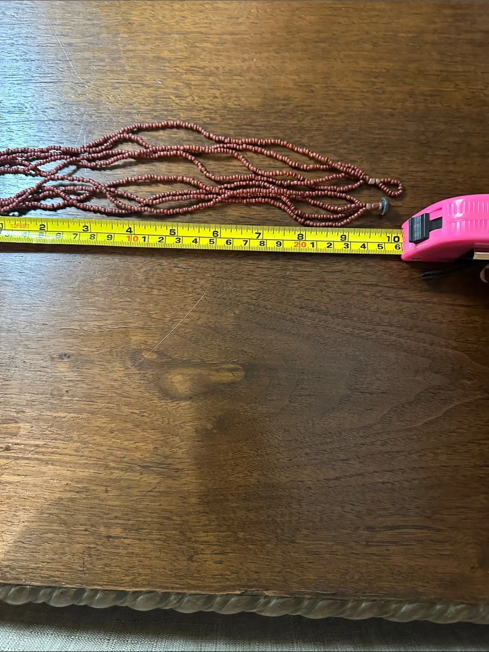 Multi-Strand Red Beaded Necklace with Iridescent Shell Pendant